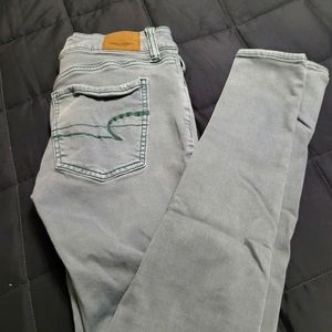 Light green AE skinny jeans